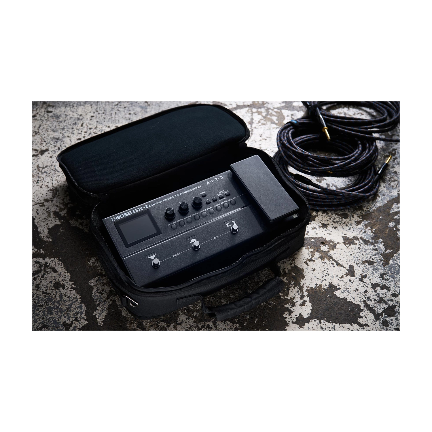Boss GX-1 Guitar Effects Processor Pedal on carry on bag, Lifestyle