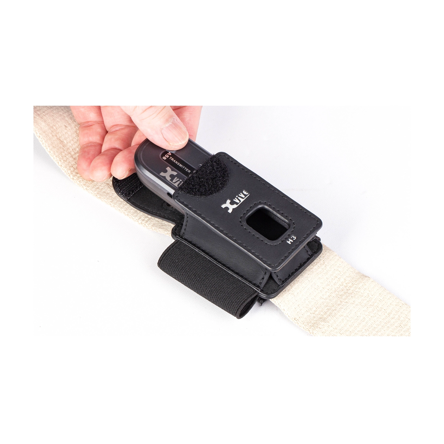 Xvive H3 Transmitter Holder For Xvive A58 And P58 on guitar strap