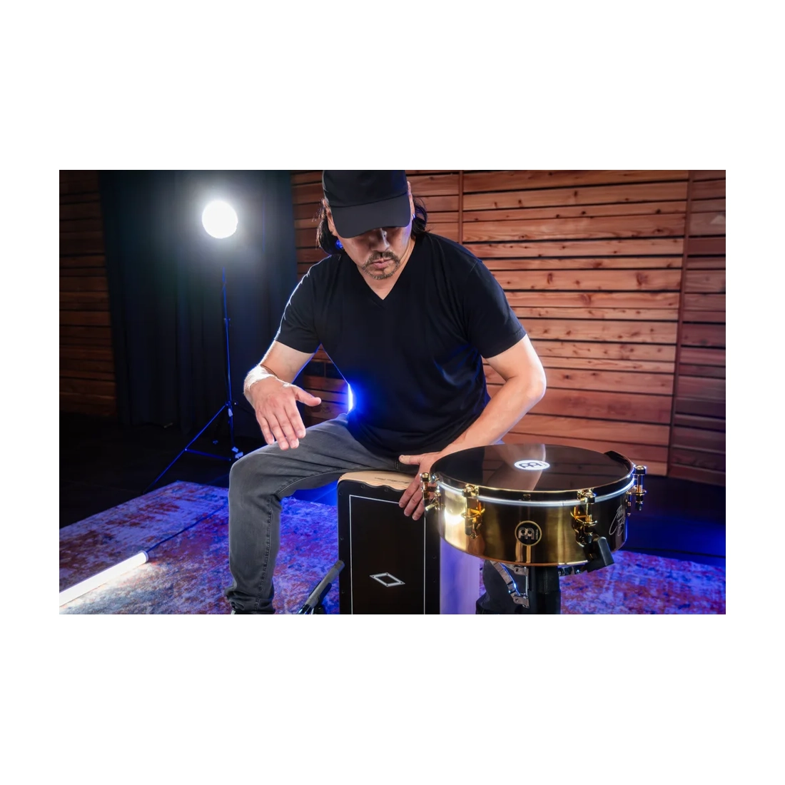 Meinl Percussion Taku Hirano Signature Hand-Bale - 13 inches - Gold Lifestyle with Taku playing Cajon and Hand Bale