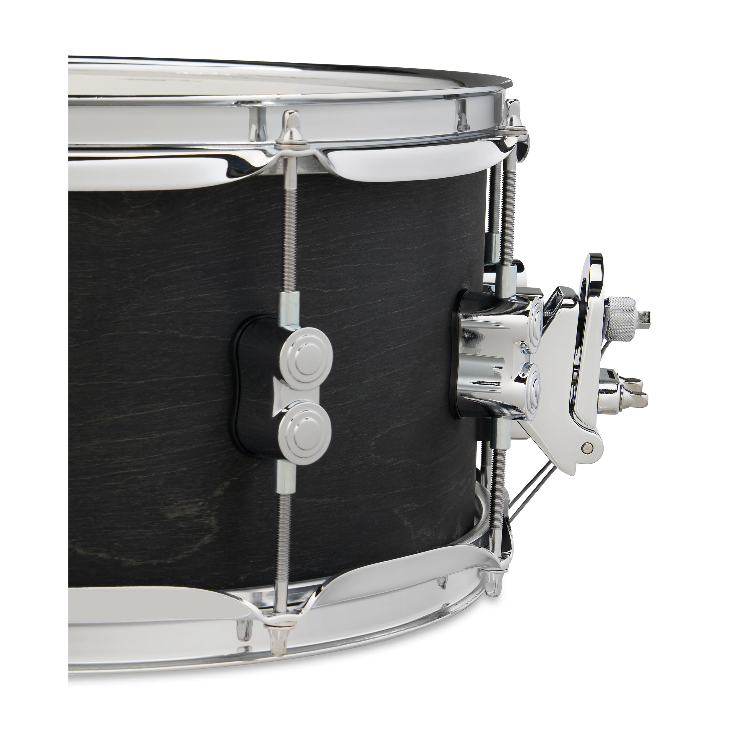 Close-up of a black drum with chrome hardware on a white background