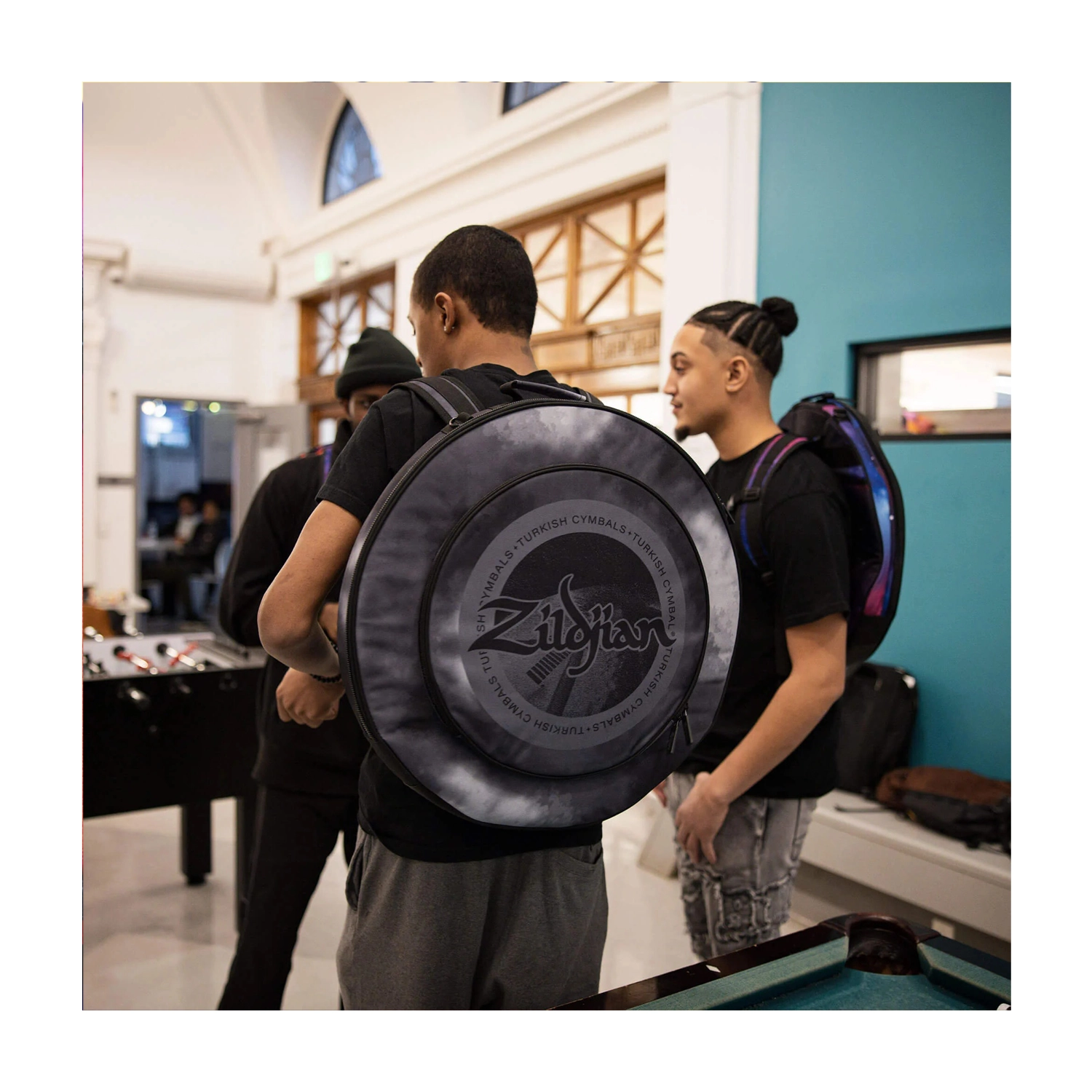 ZXCB00220 Lifestyle, Drummer walking to practice session.