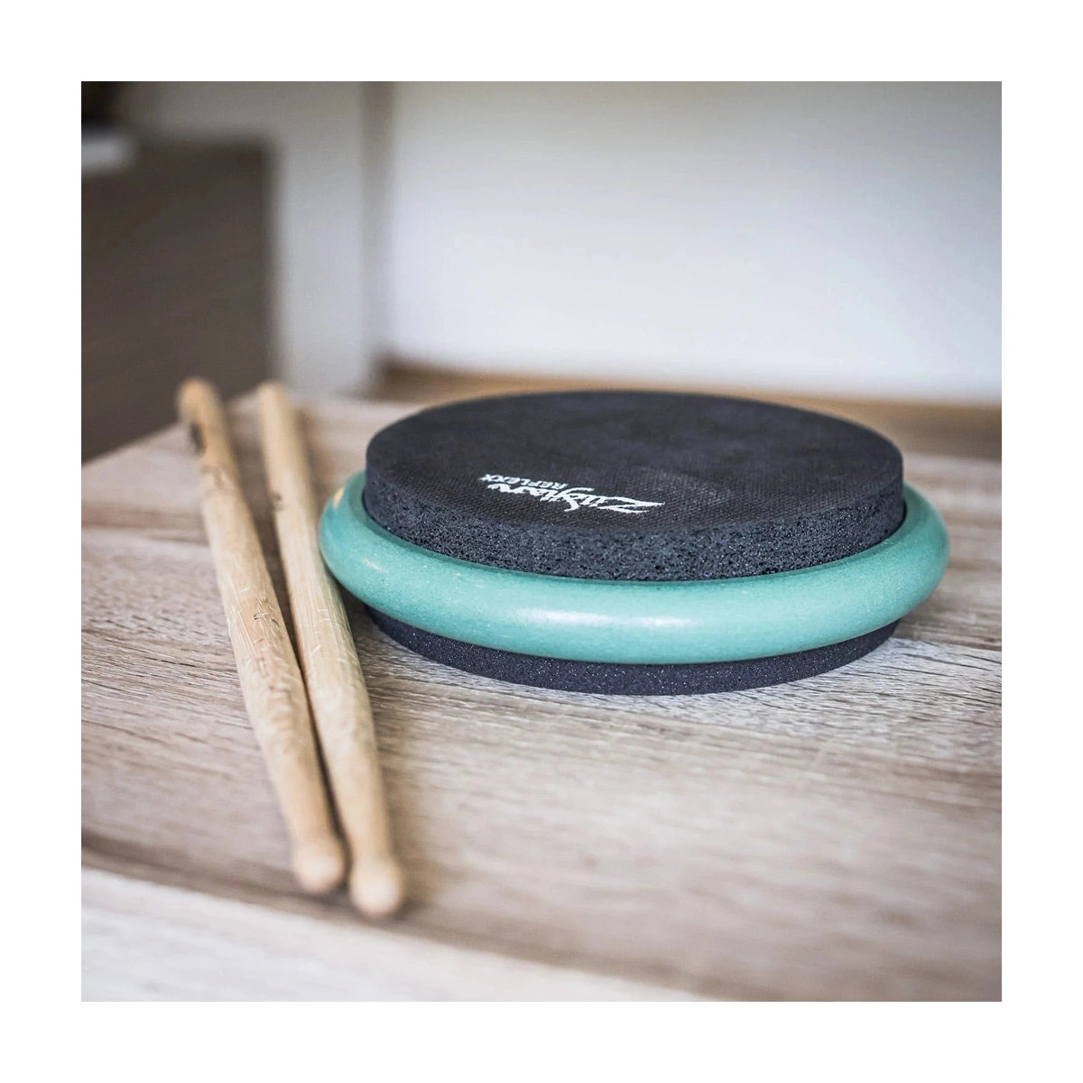 ZXPPRCG06 Lifestyle, Drum Sticks & Practice Pad ready for use.
