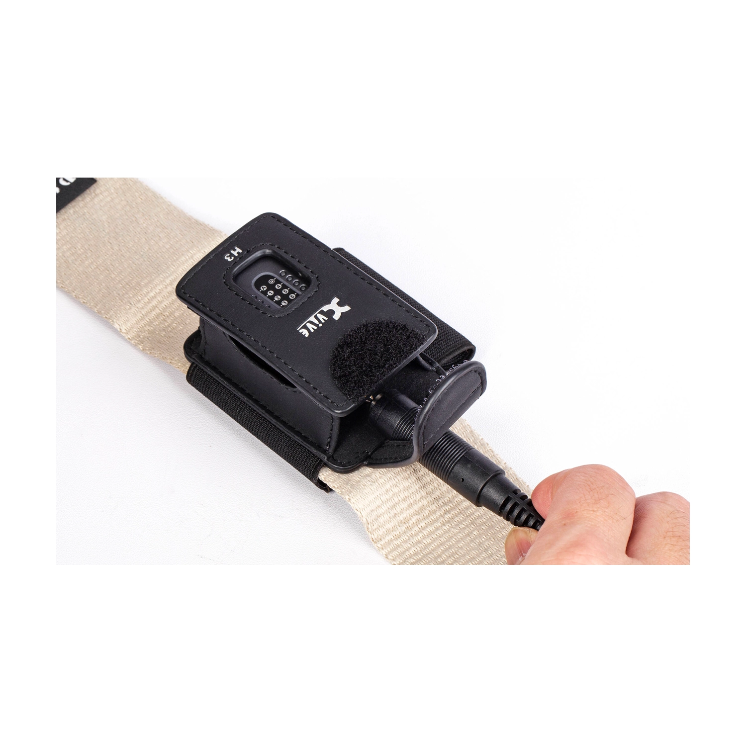 Xvive H3 Transmitter Holder For Xvive A58 And P58 on guitar strap