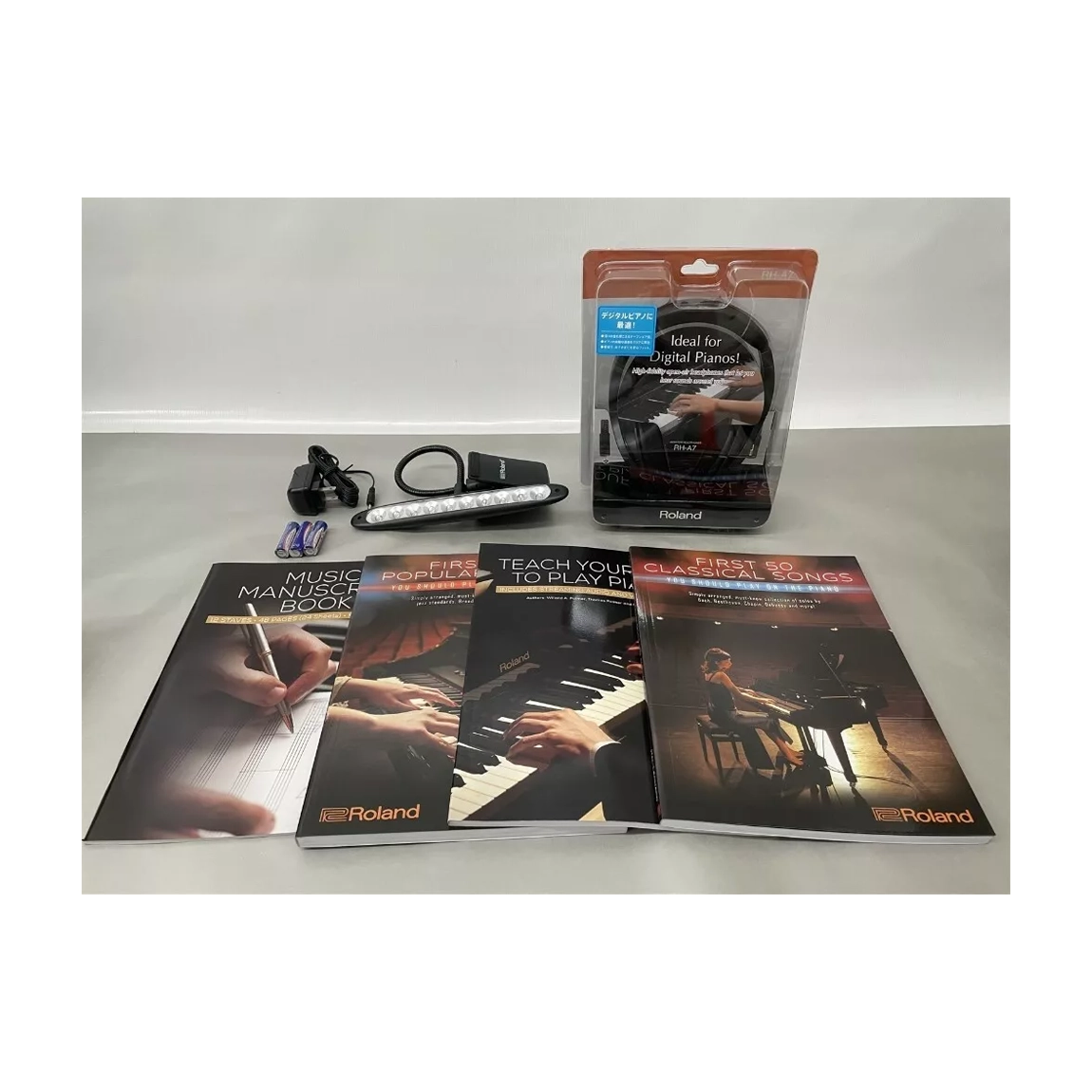Roland Piano Essential Kits W/ Music Books, Manuscript Book, Led Clip Light & Headphones
