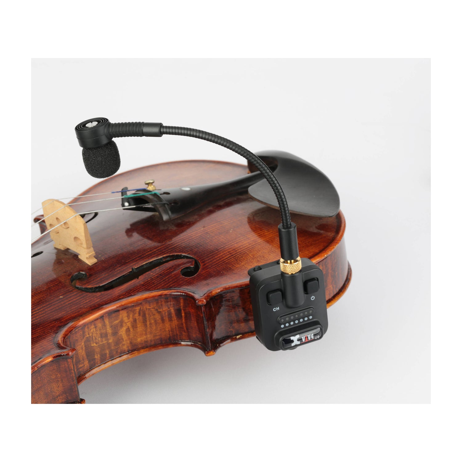 Close-up view of microphone mount on a violin